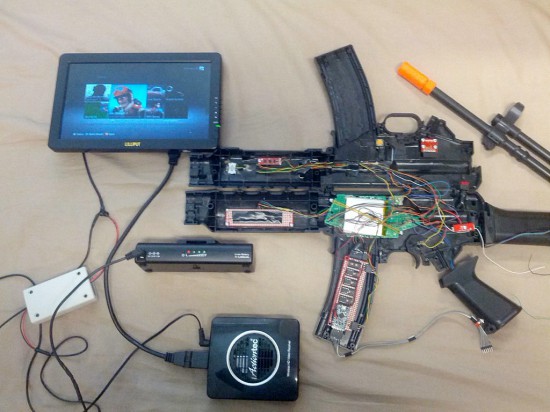 The controller in a disassembled state, with a display and wireless signal transmitter